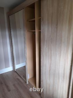 2 Large wardrobes mirrored 3 sliding doors 1 double 1 triple FREE STANDING