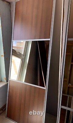 3 Sliding Doors Built in Walnut Mirrored Wardrobe & Pull Down Rail W3.525xH2.44m