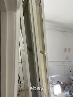 4 IKEA sliding wardrobe doors 2 pax mirrored 2 white. Length 231cm Width 76.5mm