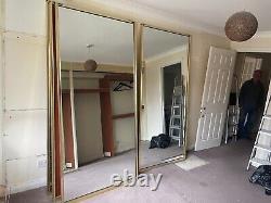 Built-in wardrobe With Mirrored sliding wardrobe doors x 4 with tracks