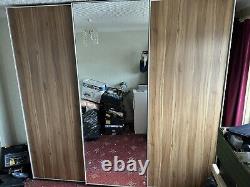 Contemporary sliding door wardrobe, Nolte, 3large doors, 1 mirror, walnut effect