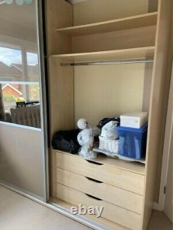 Fitted wardrobes with two sliding doors in beige and mirror finish rarely used