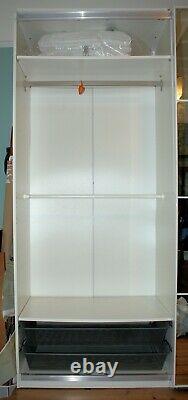 IKEA Pax double wardrobe with internal fittings, mirror sliding doors, white car