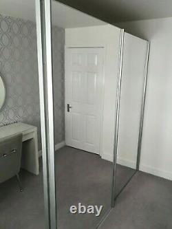 Mirrored wardrobe sliding doors