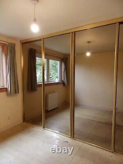 SOLD, PENDING COLLECTION Built-in wardrobe with 4 mirror sliding doors
