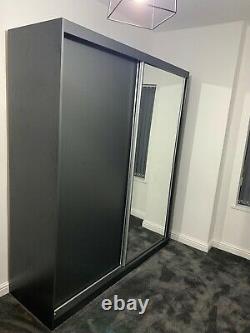 Sliding mirrored wardrobe doors